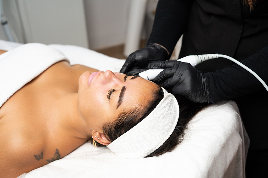Doctor providing non-surgical aesthetic treatment patient